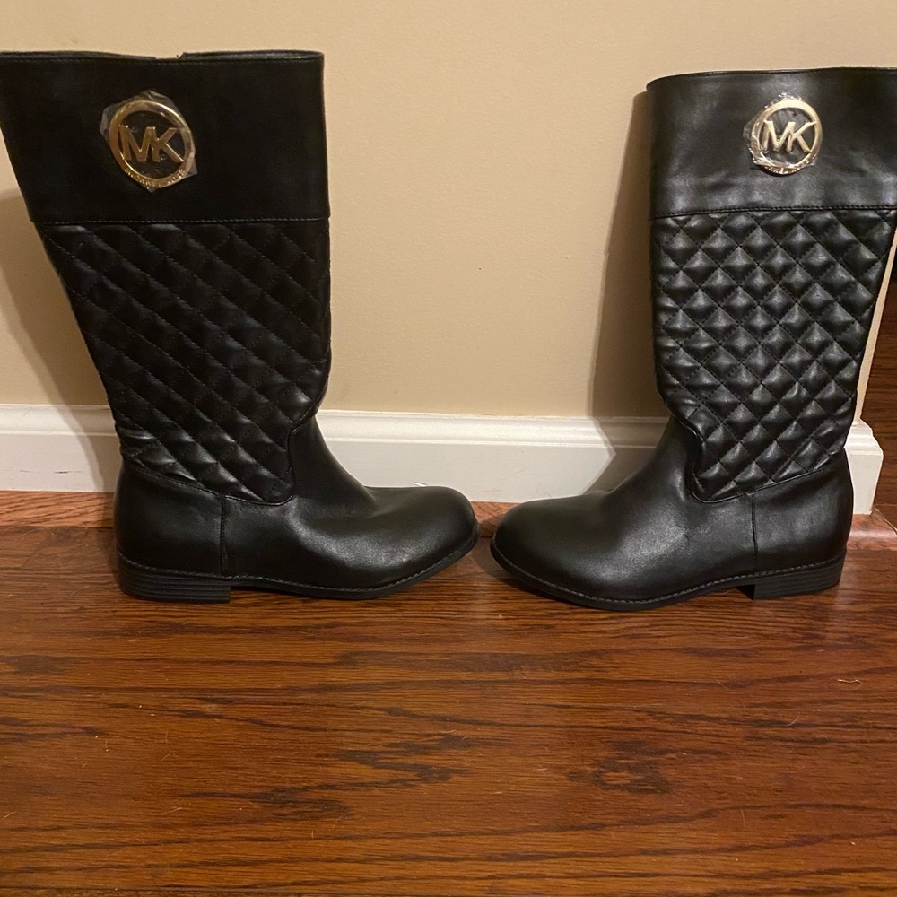 Michael Kors black boots. Kids size 4. New without box. Gold hardware.